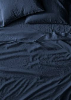 午前0時、ベッドの上で