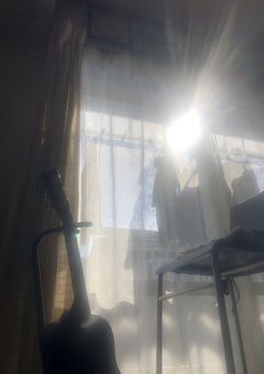 償って